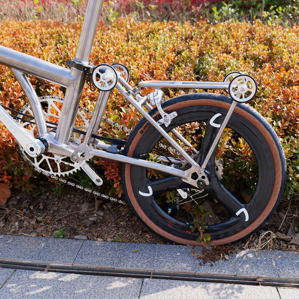 7 speedfull aero titanium brompton bike with carbon wheelsets  raw silver hand-brushed