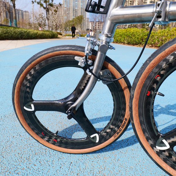 7 speedfull aero titanium brompton bike with carbon wheelsets  raw silver hand-brushed