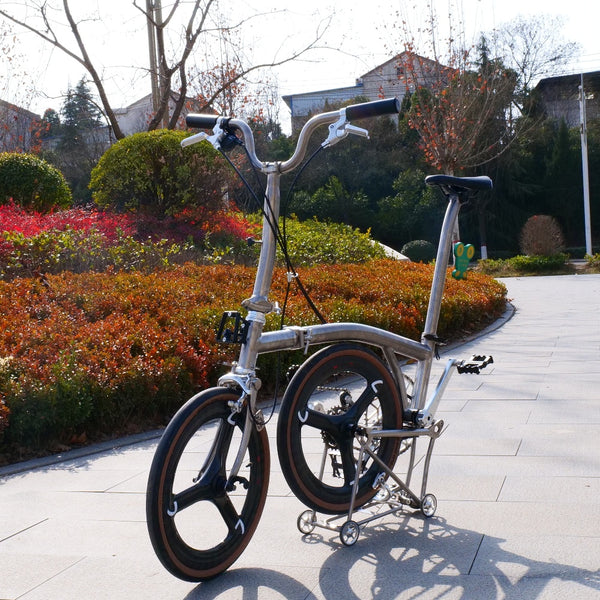 7 speedfull aero titanium brompton bike with carbon wheelsets  raw silver hand-brushed