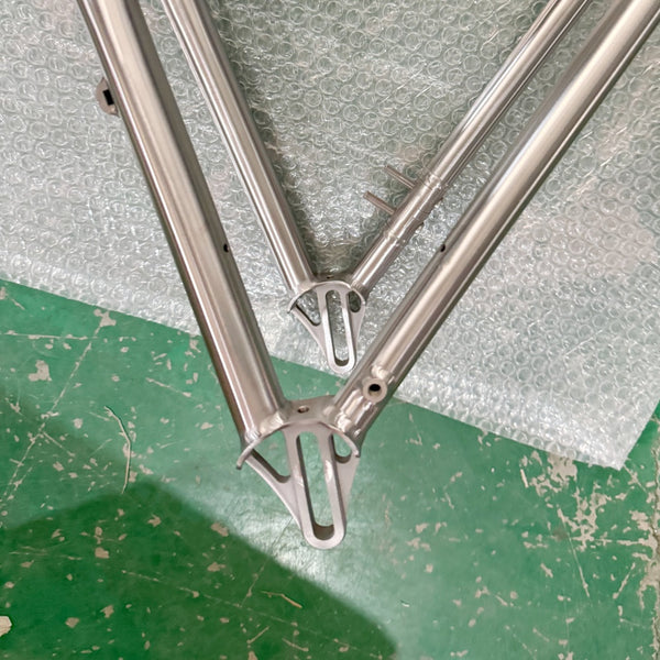 Titanium Conventional Sliding Dropouts – Flanged, 9mm Slot, 20mm Adjustment