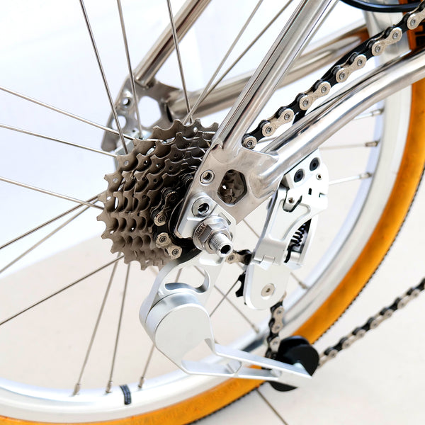 7 speed full aero titanium brompton bike with carbon wheelsets  hand polished mirror finish